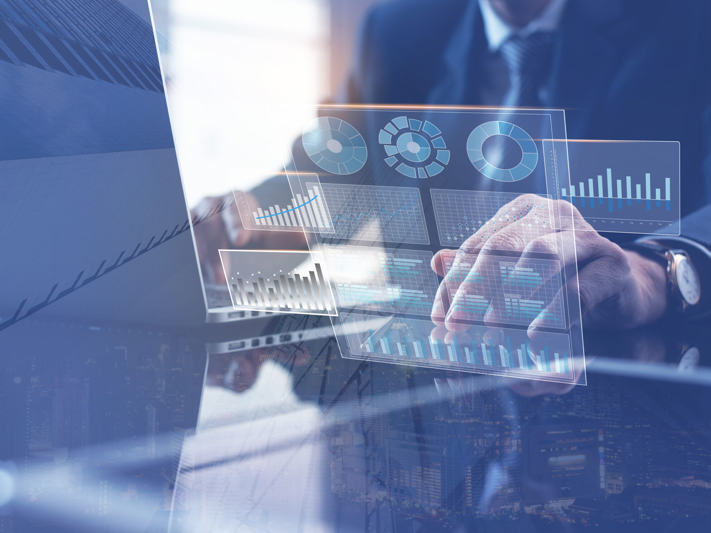 Business technology, economic growth, finance and investment concept. Businessman finance analyst analyzing marketing report on laptop computer with modern computer dashboard on virtual screen